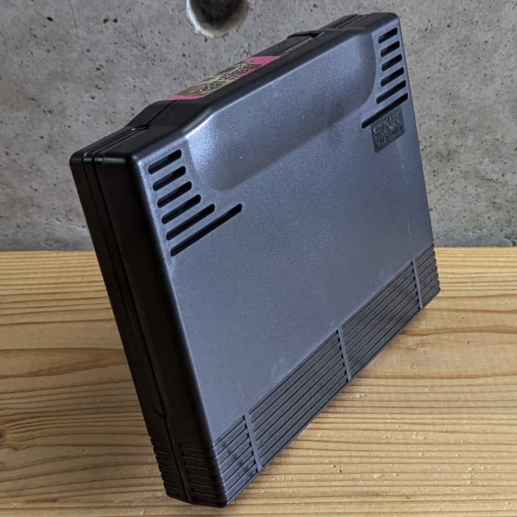 Angled rear perspective of Fatal Fury 2 Neo Geo AES cartridge on stand highlighting clean corner moldings