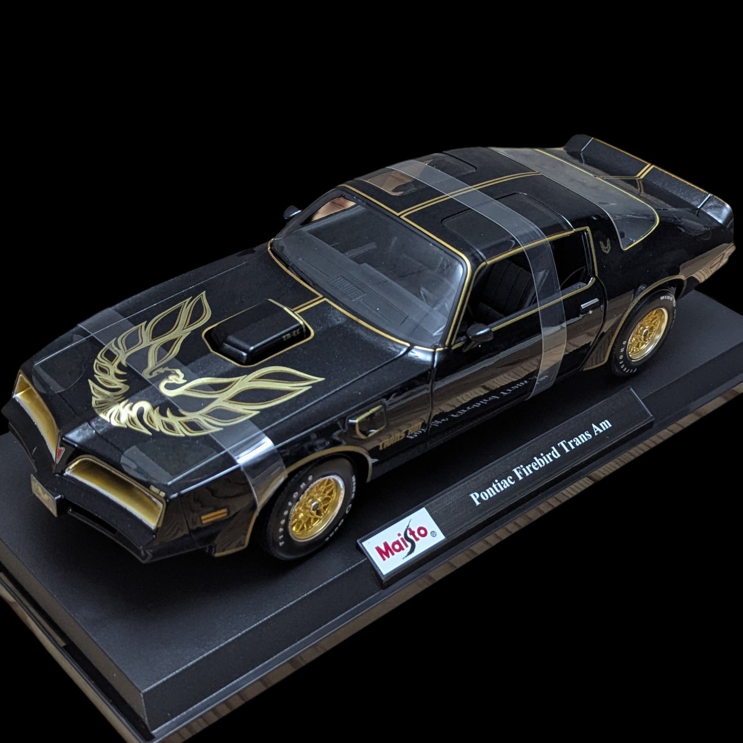 1:18 Maisto Pontiac Firebird Trans Am 1978 - Negro con detalles dorados (NUEVO) 1/18