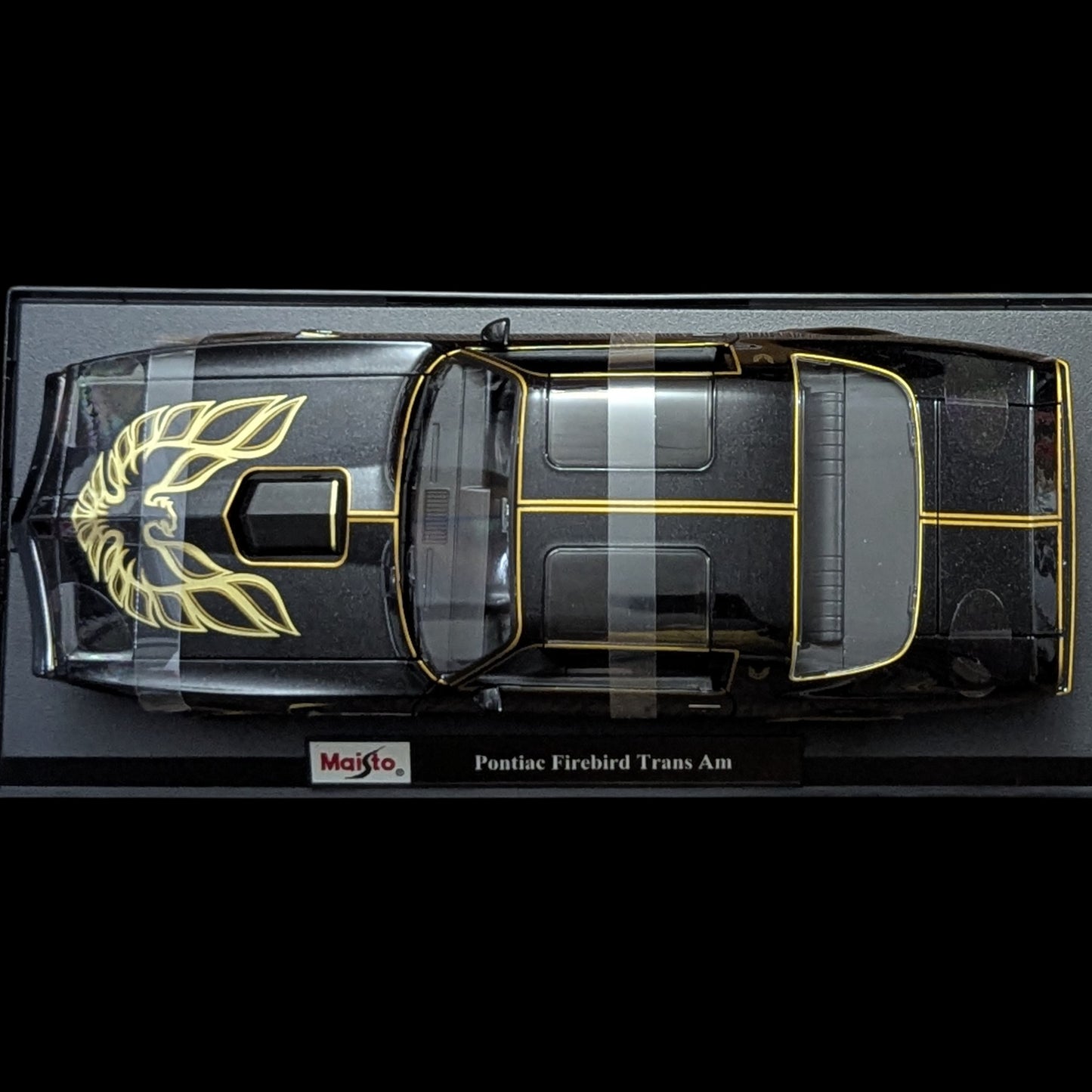 1:18 Maisto Pontiac Firebird Trans Am 1978 - Negro con detalles dorados (NUEVO) 1/18