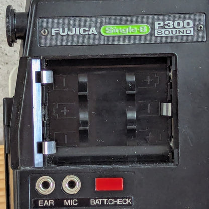 Fujica Single-8 Sound P300 open battery compartment with clean silver contacts