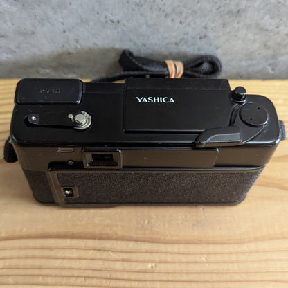 Yashica Auto Focus top plate view showing shutter button winder crank and flash push button