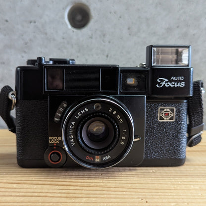 Yashica Auto Focus front view with pop-up flash extended and raised