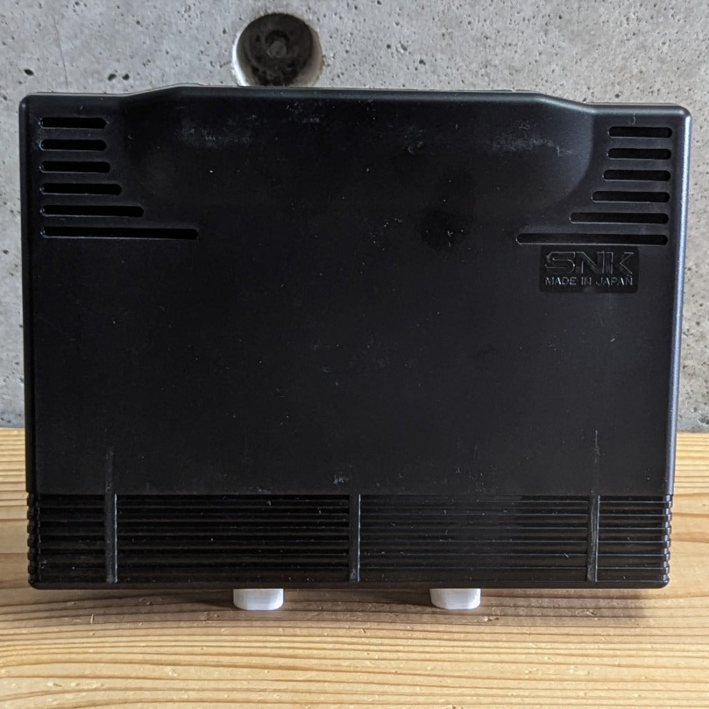 Rear view of authentic SNK Neo Geo AES ROM cartridge for Fatal Fury 2 showing Made in Japan molded logo