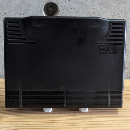 Rear view of authentic SNK Neo Geo AES ROM cartridge for Fatal Fury 2 showing Made in Japan molded logo