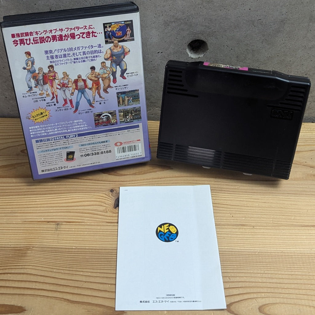 Rear view of complete Garou Densetsu 2 Fatal Fury 2 Neo Geo AES set showing back of clamshell case barcode 4964808100507 and manual