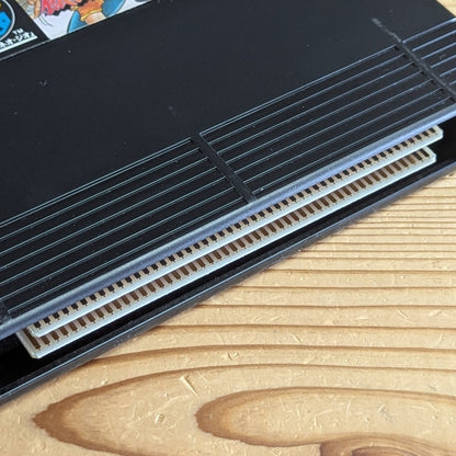 Detailed macro close-up of Garou Densetsu 2 Neo Geo AES dual PCB edge connector pins showing clean original gold contacts