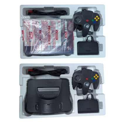 Original styrofoam inner tray packaging layers showing console controller cables and manual in protective bag