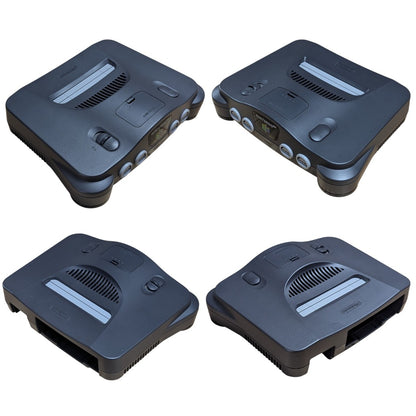 Four angle perspective view of Nintendo 64 Charcoal Grey console chassis showing power switch ports and vents