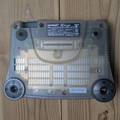 Bottom base of Nintendo 64 Clear Blue console NUS-001 showing authentic serial number sticker NUJ15497493