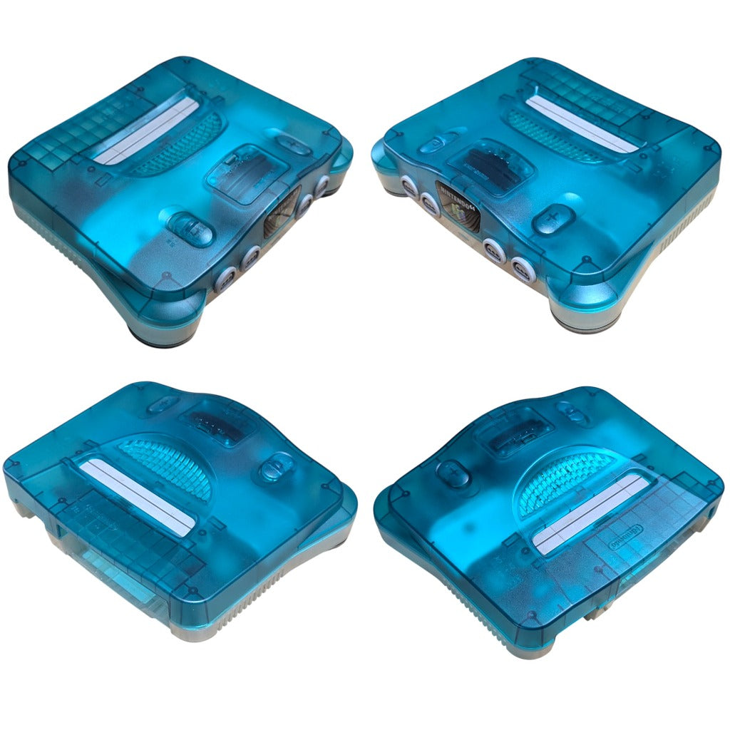 Four angle perspective view of Nintendo 64 Clear Blue translucent chassis showing pristine condition and ports
