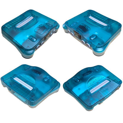 Four angle perspective view of Nintendo 64 Clear Blue translucent chassis showing pristine condition and ports
