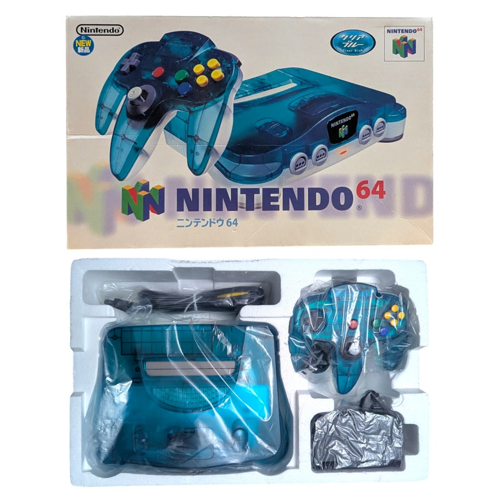 Original styrofoam inner tray packaging of Nintendo 64 Clear Blue showing console controller and wrapped cables