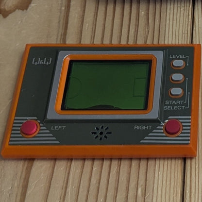 Q&Q Card Game Clock Handheld 3/4 Front View Left and Right Controls