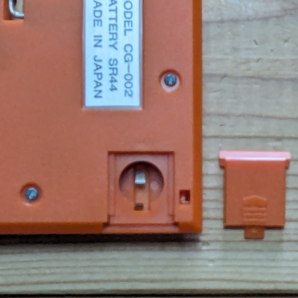 Q&Q Battery Compartment Clean Contacts with Battery Cover Removed