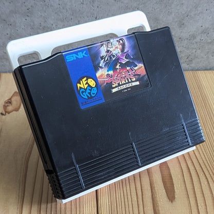 SNK Neo Geo AES original ROM cartridge front view of Shin Samurai Spirits Haohmaru Jigokuhen with pristine label on stand