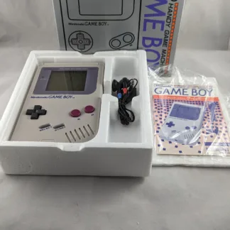 Game boy with box, instructions, headphones.